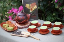 Bộ Ấm Chén Tử Sa Đắp Hoa Sen Đỏ Đen Tách Lót