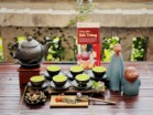 Bộ Ấm Chén Tử Sa Đắp Hoa Đào Tách Lót