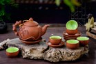 Bộ Ấm Chén Tử Sa Đắp Cây Tùng Tách Lót Đỏ