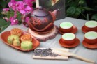 Bộ Ấm Chén Tử Sa Đắp Hoa Sen Đỏ Đen Tách Lót